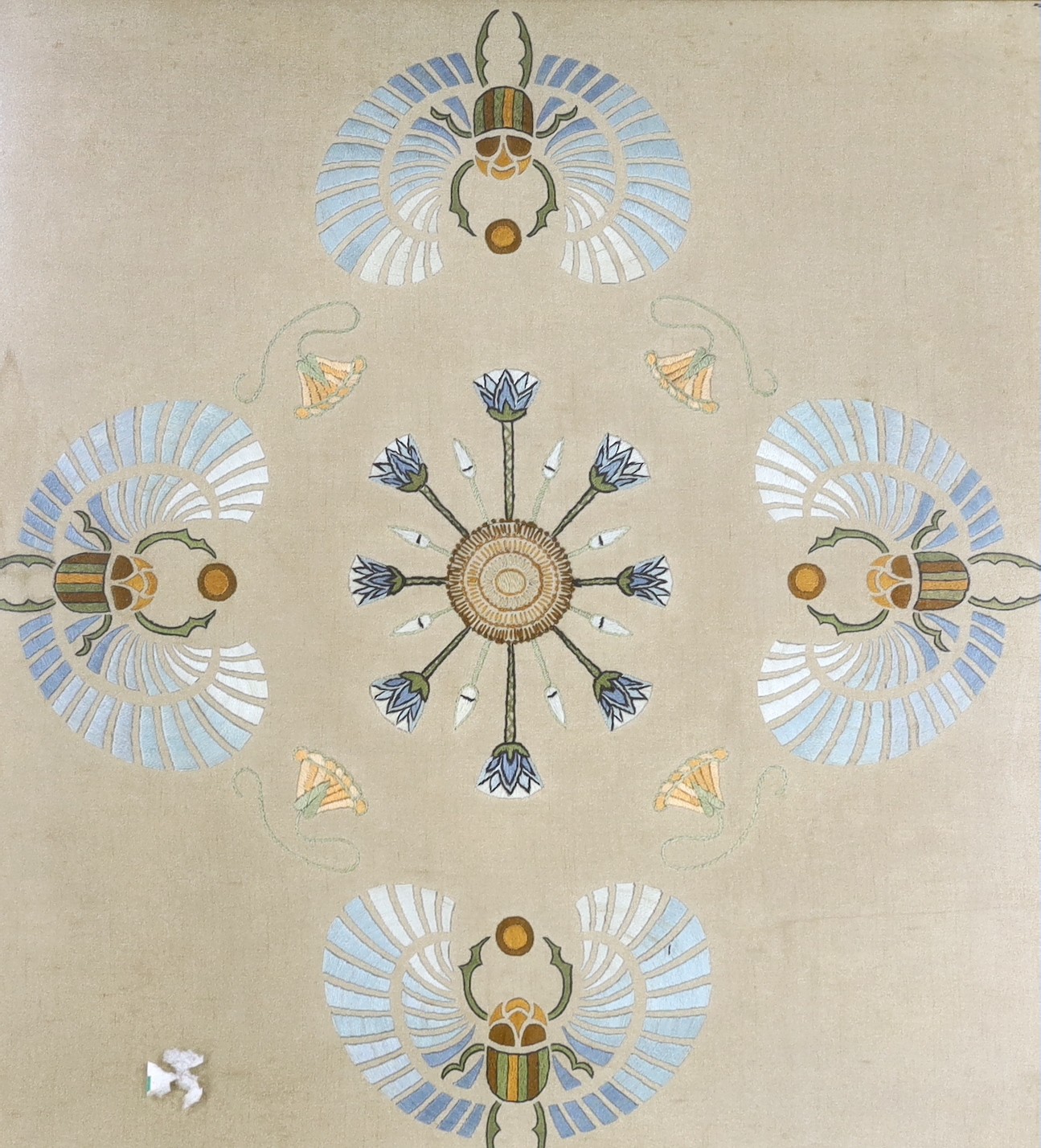 An Arts and Crafts multi coloured silk embroidery of stylistic scarab beetles. 58 x 50cm